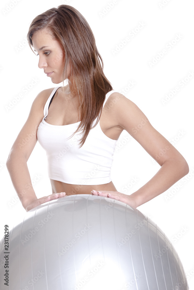 Young woman in doing fitness exercises with pilates gym ball Young woman in doing fitness exercises with pilates gym ball