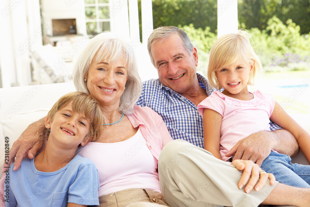 Portrait Of Grandparents With Grandchildren Relaxing Together Portrait Of Grandparents With Grandchildren Relaxing Together