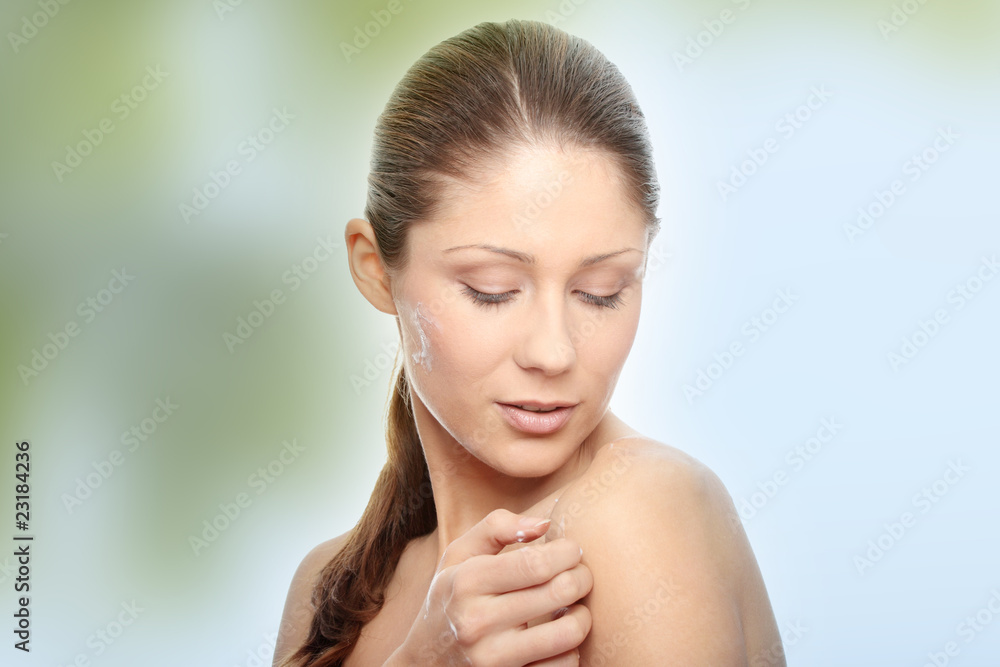 Beautiful young woman with cream Beautiful young woman with cream