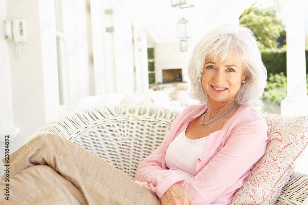 Portrait Of Senior Woman Relaxing In Chair Portrait Of Senior Woman Relaxing In Chair