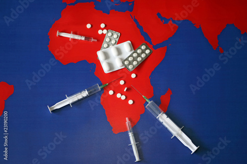 Map with tabletes, syringes and needles