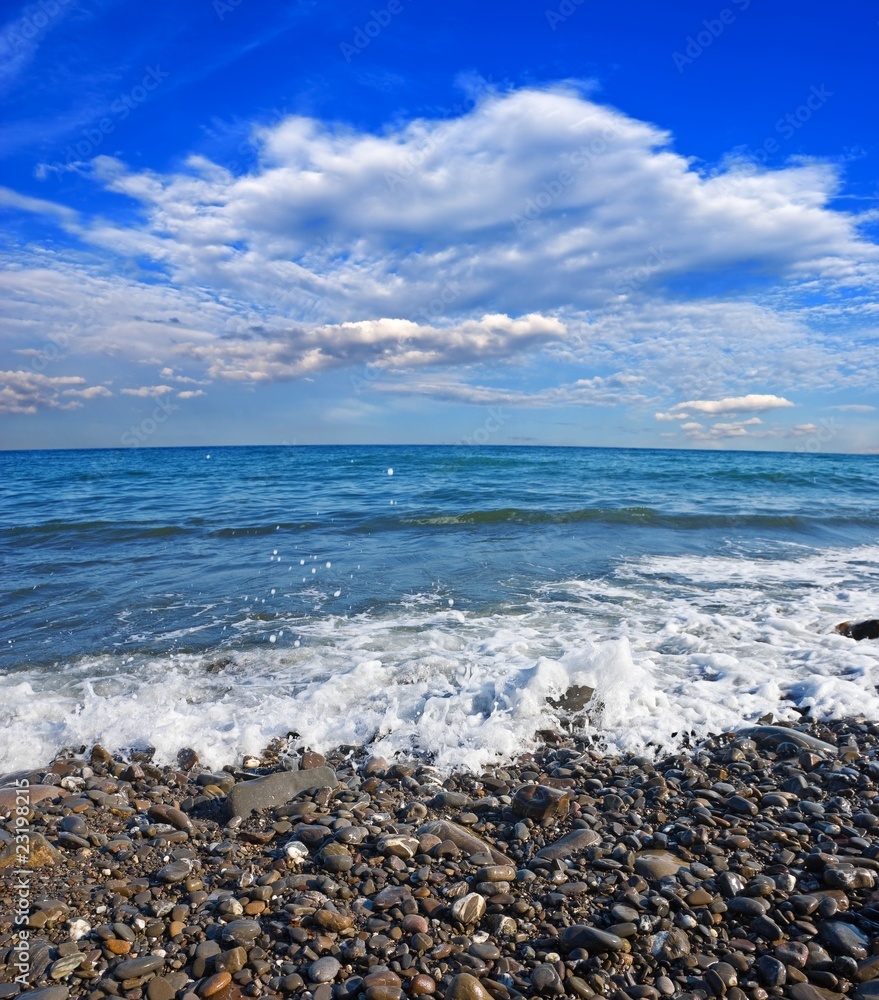 varicolored pebbles on a marine coast