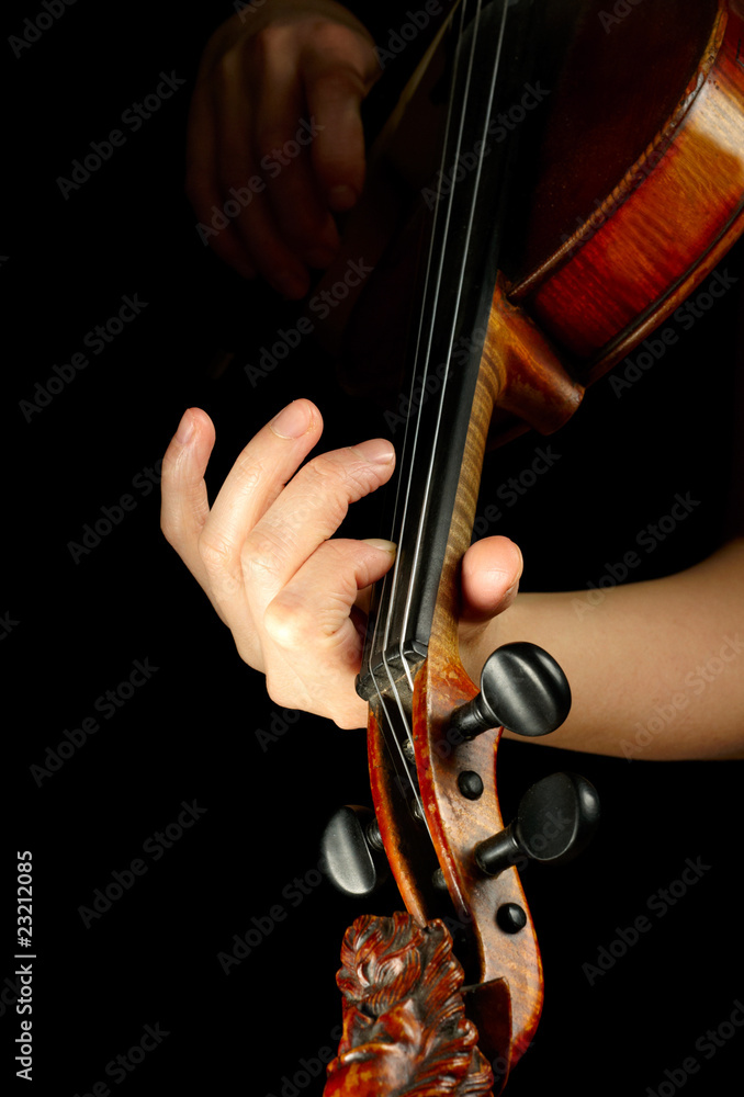 Musician playing violin isolated on black Musician playing violin isolated on black