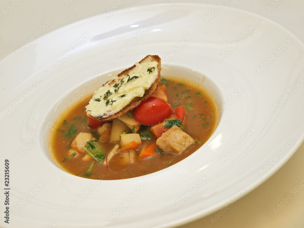 vegetable and meat soup served with crusty bread and butter vegetable and meat soup served with crusty bread and butter