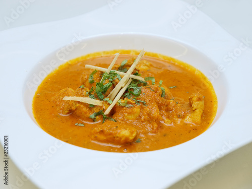 chicken curry soup with fresh ginger slices