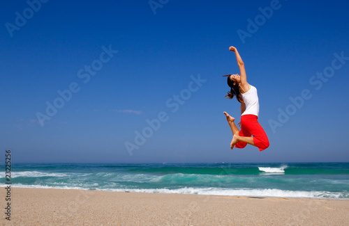 Young woman jumping