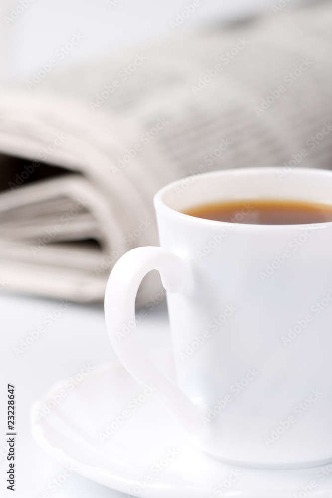 cup of coffee and newspapers cup of coffee and newspapers