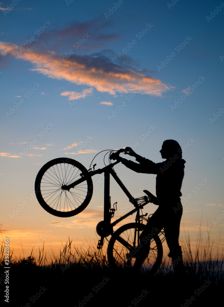 Obraz premium Biking sunset
