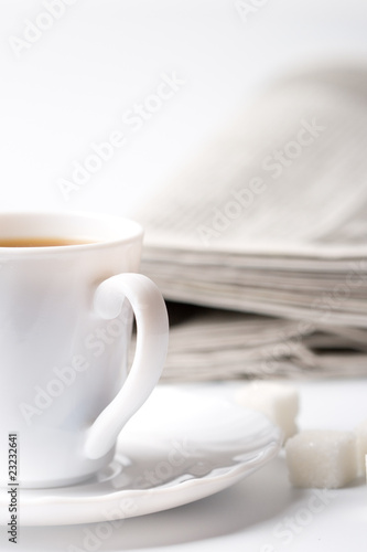 cup of coffee and newspapers