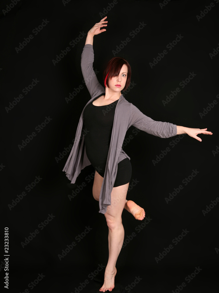 Fotografie woman dancer on black background