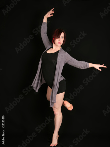 Canvas Print woman dancer on black background