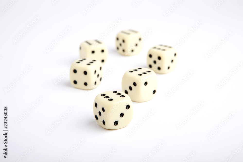 Six dice isolated, all sixes, slight vignetting