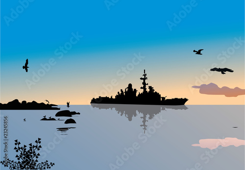 military ship and reflection in the sea