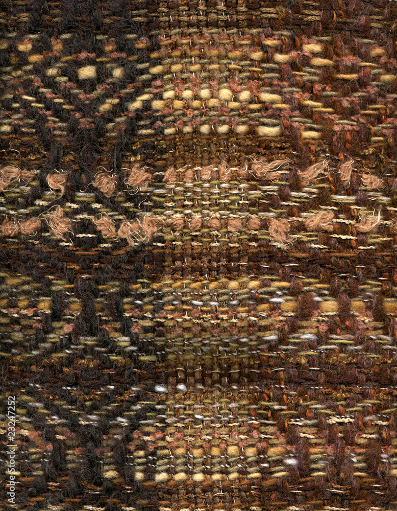 Detail of hand woven decorative brown fabric