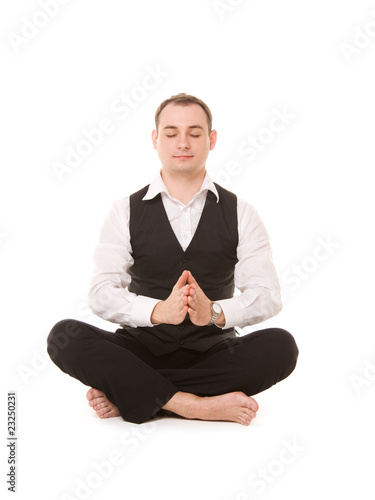 businessman sitting in lotus pose