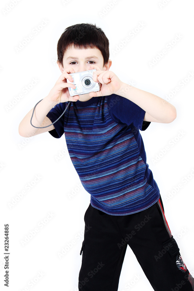 Young boy with digital camera prepare for shooting Young boy with digital camera prepare for shooting