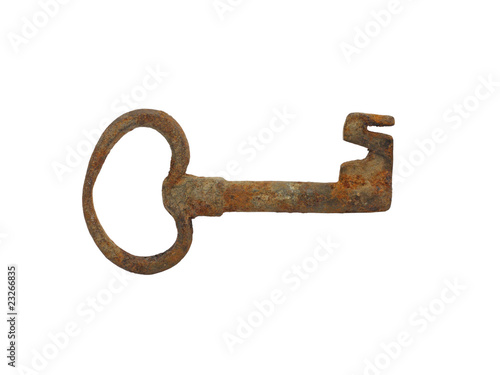 Rusty old key isolated on white