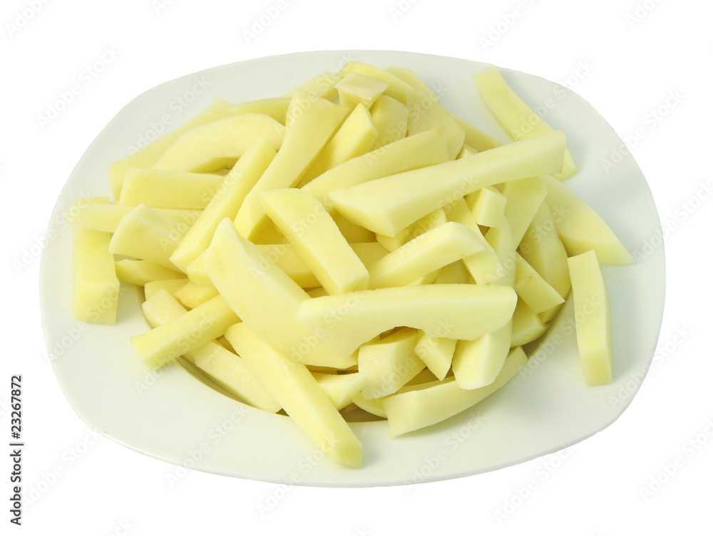 Plate of raw french fries isolated on white Plate of raw french fries isolated on white