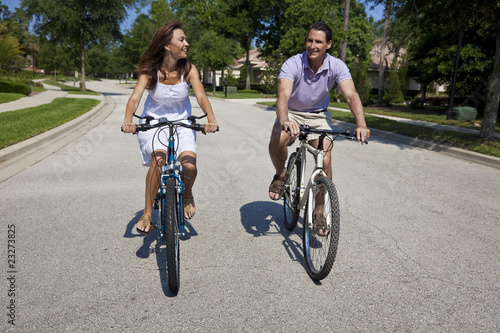 Romantic Man and Woman Couple Cycling Together © Darren Baker