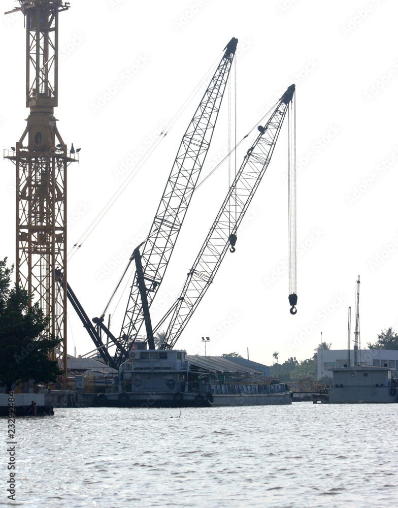 Fototapeta premium Cranes by the sea