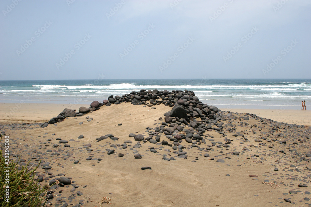 stone shelter on beach