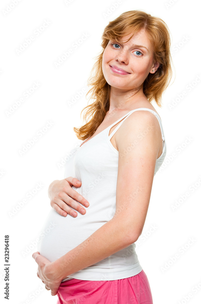young pregnant woman holding her hands on her tummy young pregnant woman holding her hands on her tummy