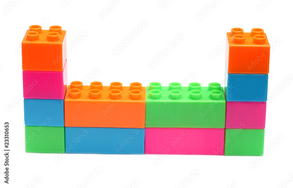Fototapeta premium Colorful plastic toy bricks make structure