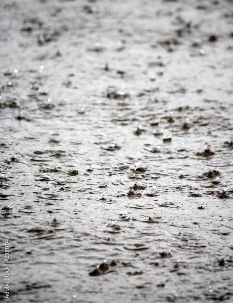 Rain drops rippling background Rain drops rippling background