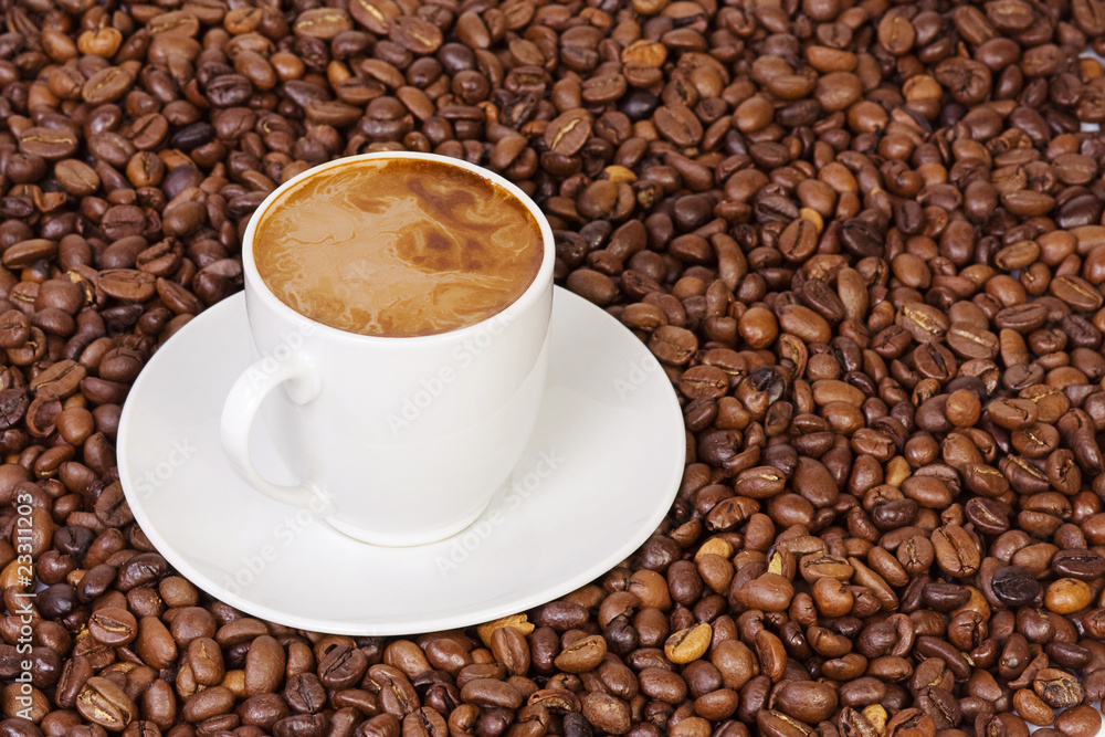 coffee beans and cup of drink coffee beans and cup of drink