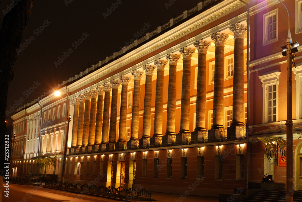 building with lighted columns