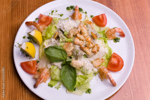 The delicious salad with seafood.