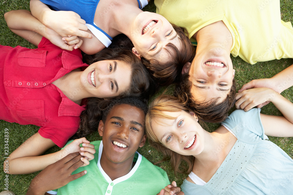 Fototapeta premium Group Of Teenagers Looking Up Into Camera