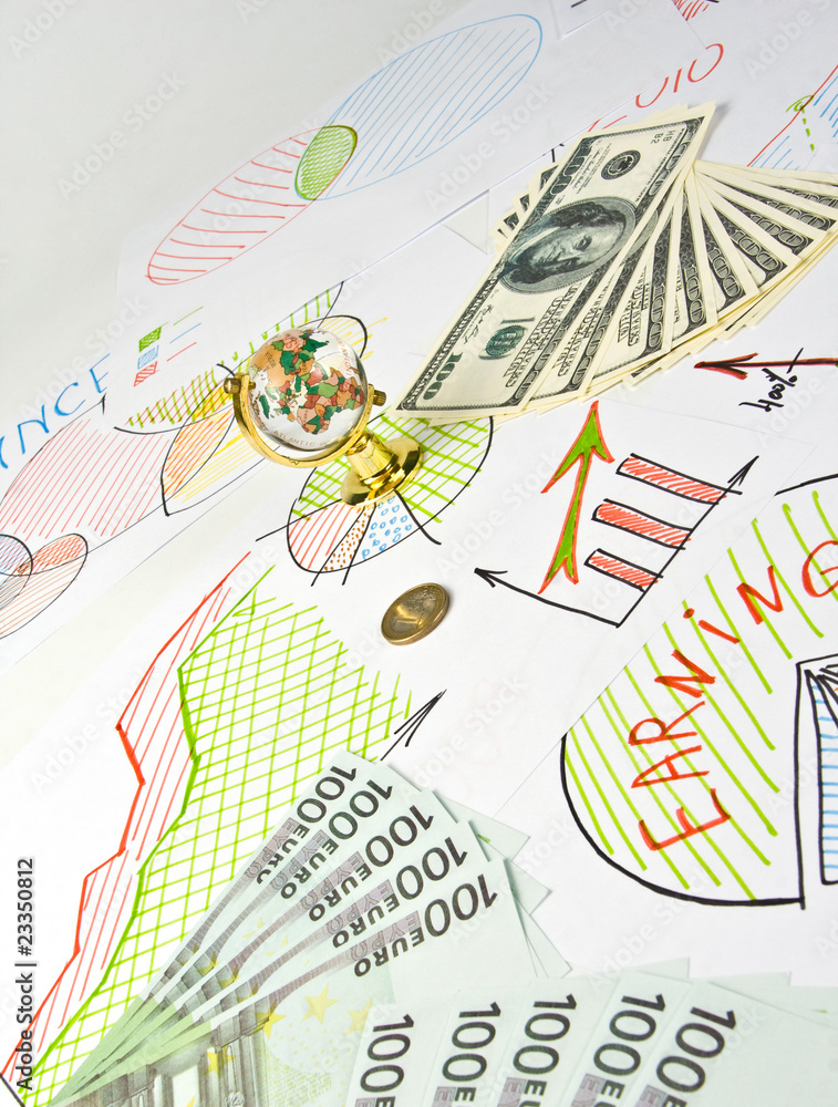 Business diagrams, glass globe and money