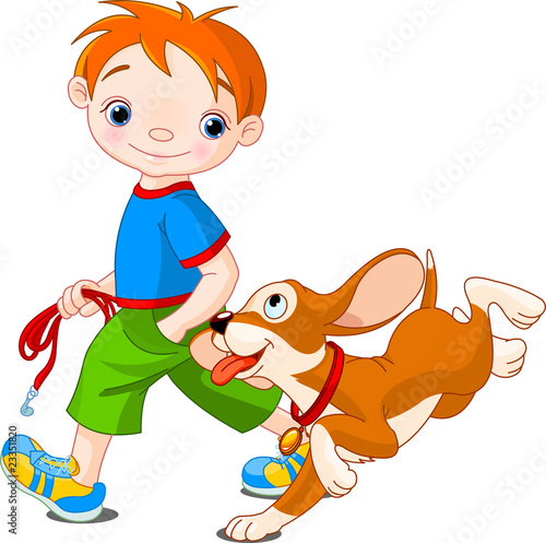 Boy walking a dog
