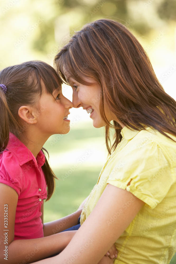 Portrait Of Mother And Daughter Together In Park Portrait Of Mother And Daughter Together In Park