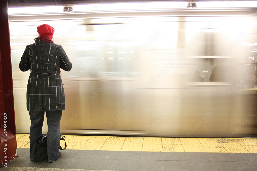 Fototapeta premium Person waiting for the subway in Manhattan New York