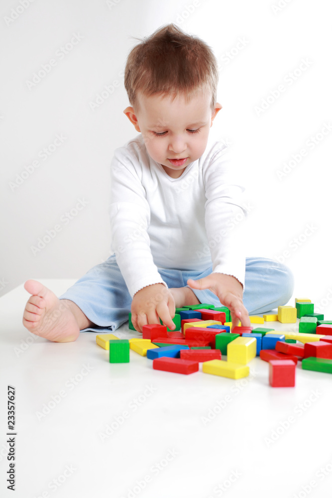 Lovely boy playing with blocks Lovely boy playing with blocks