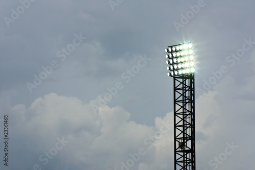 Stadium spotlight under cloud