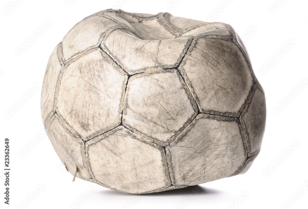 old deflated soccer ball isolated on white Photos | Adobe Stock