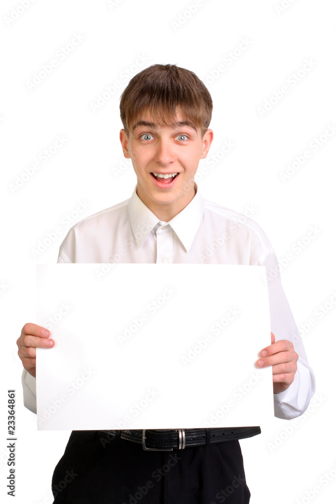 amazed teenager holding blank paper isolated on the white amazed teenager holding blank paper isolated on the white