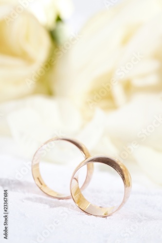 golden rings and rose petals