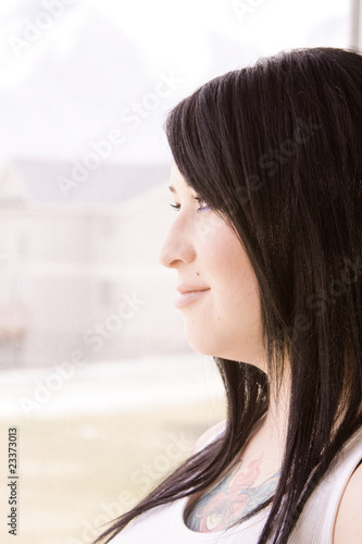 Close up on a Woman by the Window