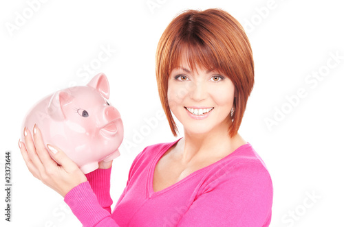 lovely woman with piggy bank