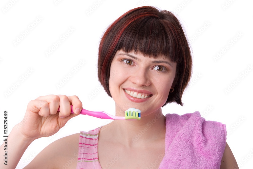 Woman cleaning her teeth.