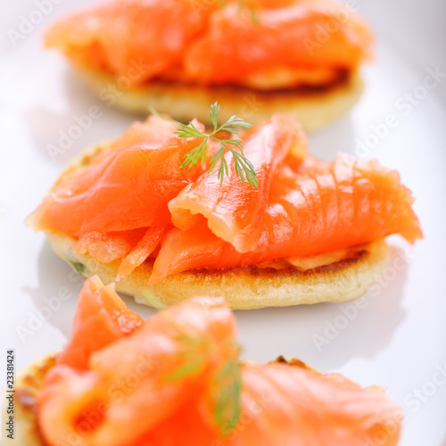 delicious appetizer with salmon pancakes