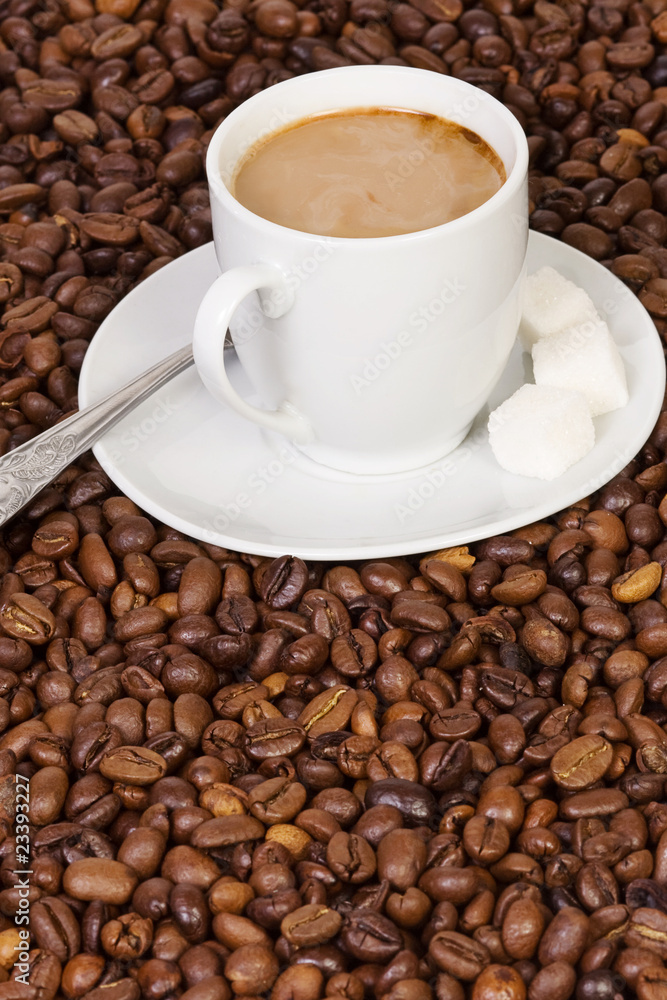 spoon and cup of coffee spoon and cup of coffee