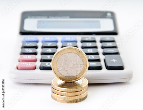 Euro coins and calculator