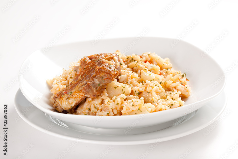 rice dish with potatoes and pork chops rice dish with potatoes and pork chops