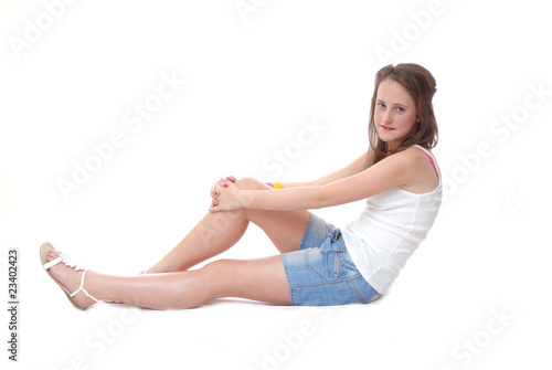 Cute teenage girl relaxing in shorts