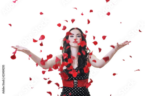 woman with falling rose petals